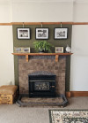 Fireplace, fireplace with wall behind featuring Resene Waiouru, brick and olive green fireplace